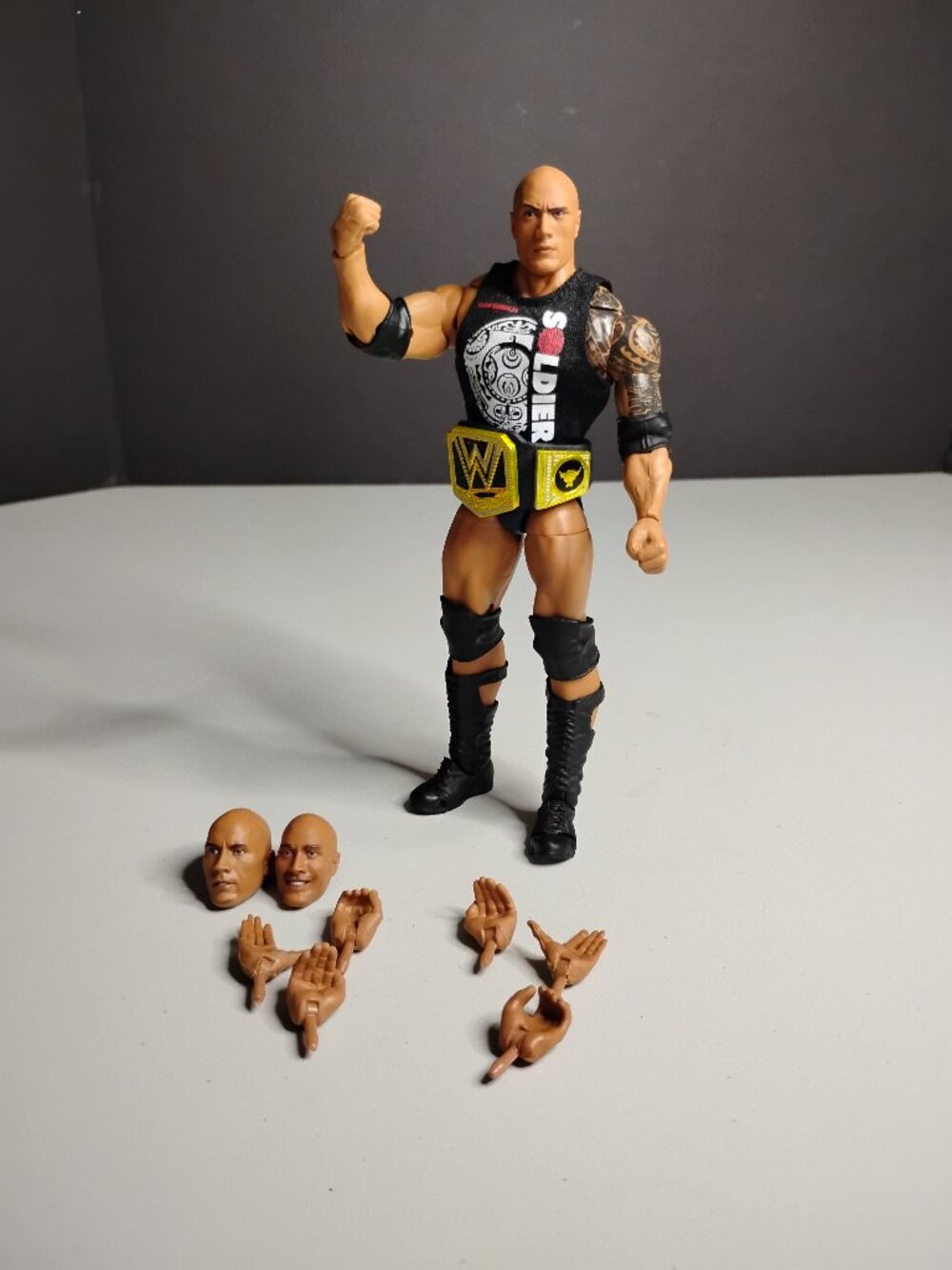 WWE Ultimate Edition The Rock Action Figure with Interchangeable Heads and Hands